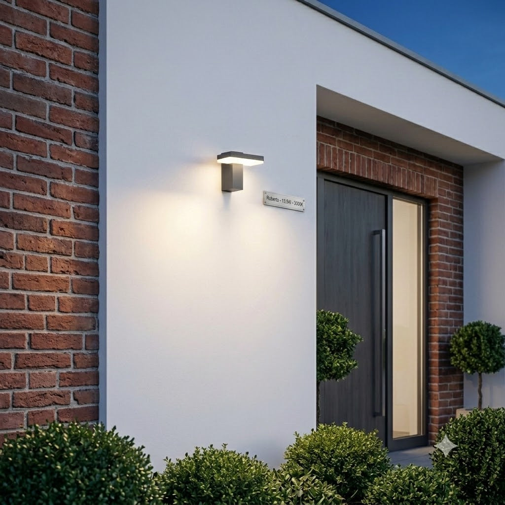 Sfeerfoto van de roberto buiten wandlamp zonder sensoren geplaatst tegen een strakke witten gevel van een moderne woning